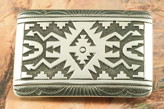 Beautiful Contemporary Design in this Sterling Silver Belt Buckle. Created by Navajo Artist Tommy Singer. Signed by the artist.
